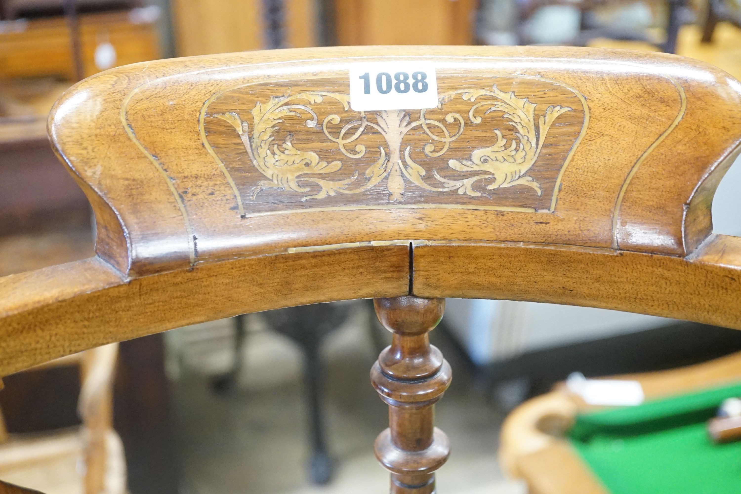 A late Victorian walnut corner elbow chair